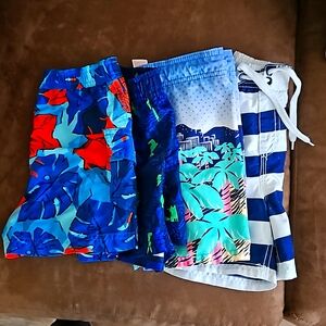 Bundle 4 swim trunks - like new!